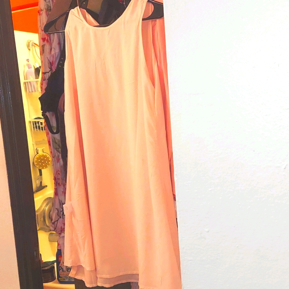 A shaped flowing summer dress perfect for weddings